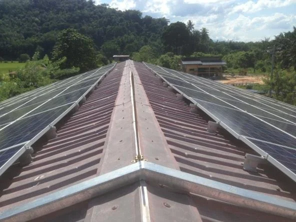 Rows of installed solar panels on an existing roof in Kota Marudu, Sabah